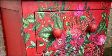 Cabinet from Little Gems Interiors upcycled in red shades