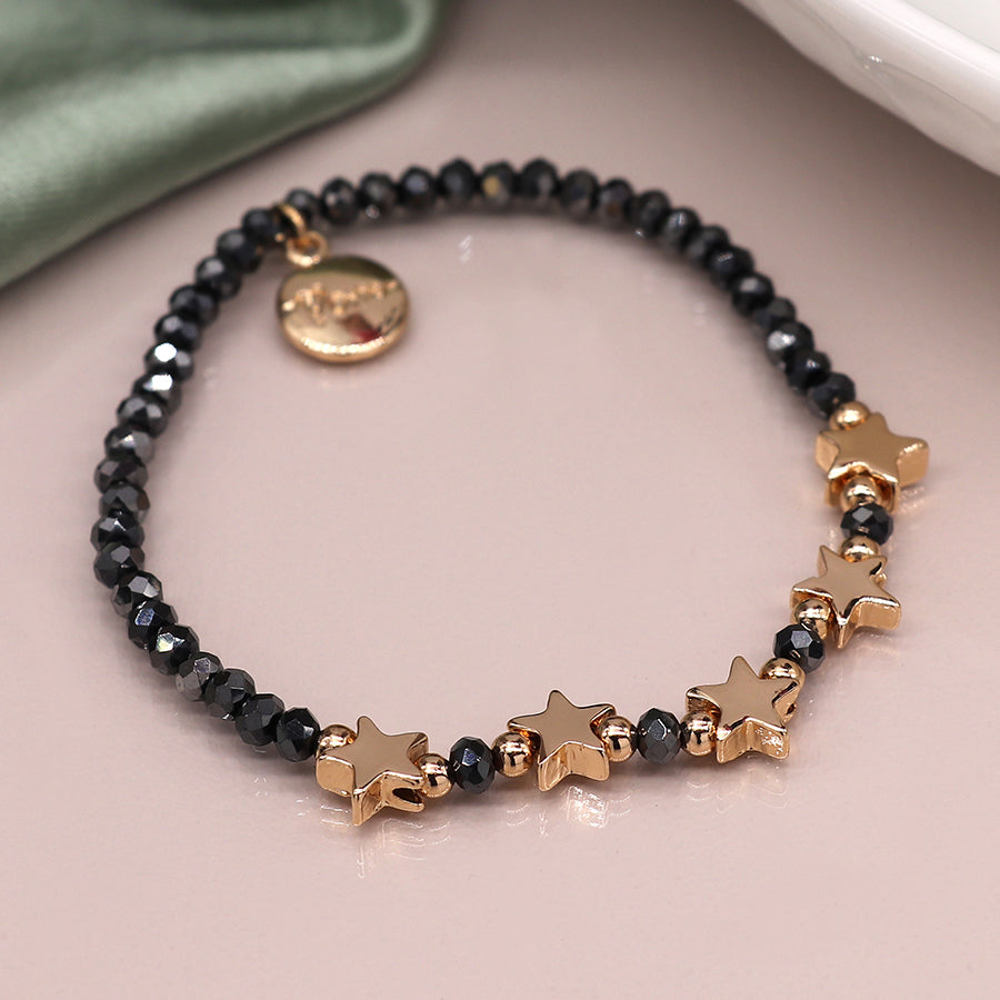 Midnight bead bracelet with golden stars and metallic beads