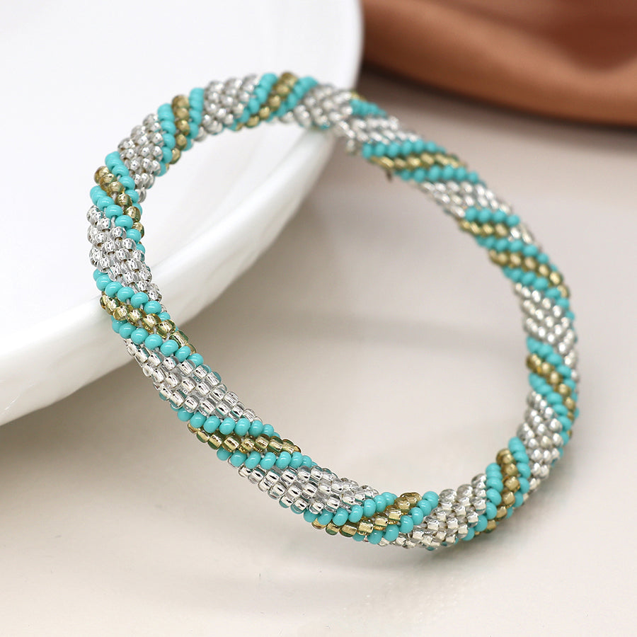 Aqua and metallic twist bead bracelet