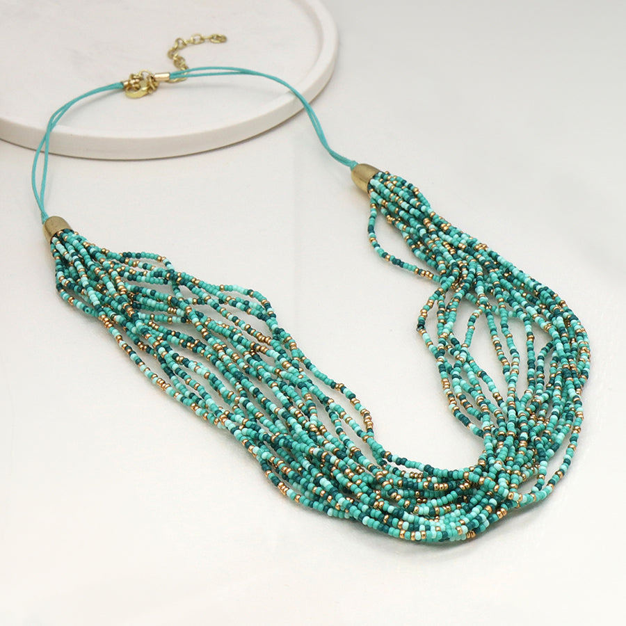 Aqua mix multi strand necklace with golden fastening
