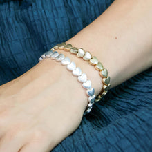 Load image into Gallery viewer, Silver plated polished small hearts stretch bracelet
