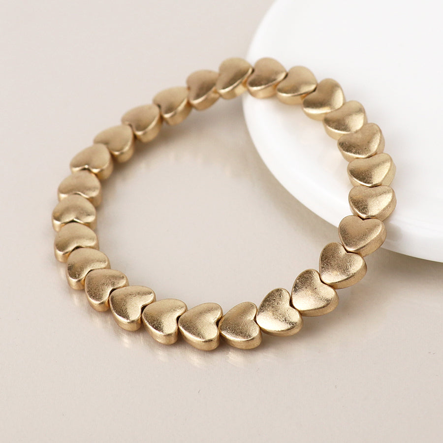 Gold plated polished small hearts stretch bracelet