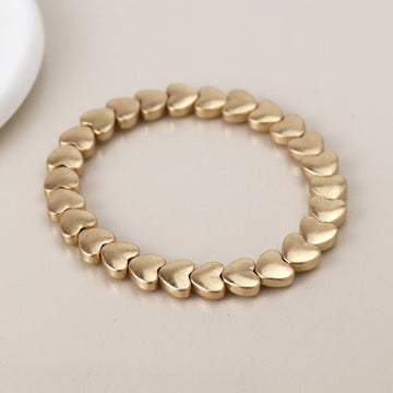 Gold plated polished small hearts stretch bracelet