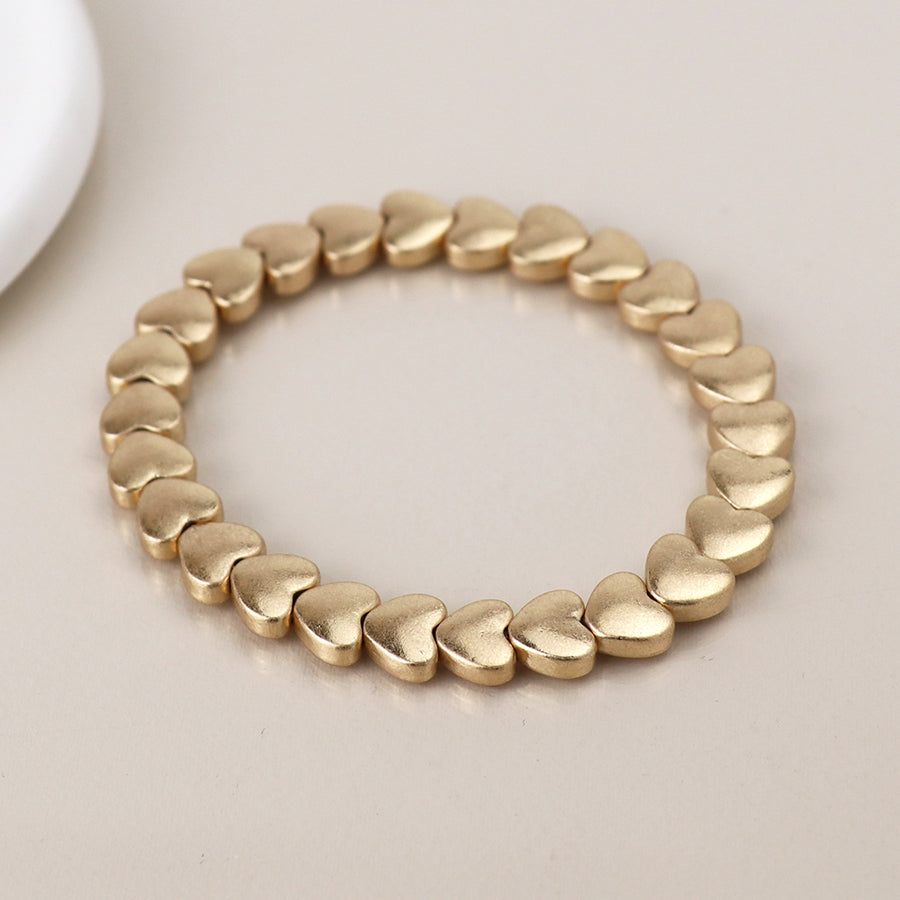 Gold plated polished small hearts stretch bracelet