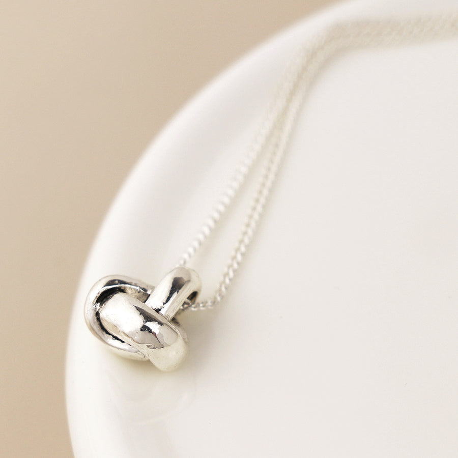 Silver plated infinity knot necklace