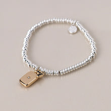 Load image into Gallery viewer, Silver plated amulet and heart charm bracelet

