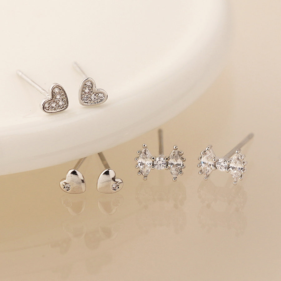 Silver plated bows and hearts triple stud earring set