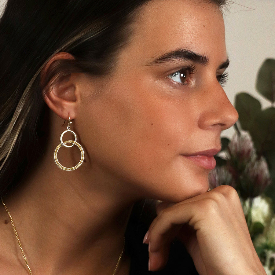 Silver plated double loop and golden bead earrings
