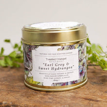 Load image into Gallery viewer, Earl Grey &amp; Sweet Hydrangea Candle in a Matt Gold Tin
