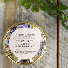 Load image into Gallery viewer, Earl Grey &amp; Sweet Hydrangea Candle in a Matt Gold Tin
