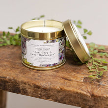 Load image into Gallery viewer, Earl Grey &amp; Sweet Hydrangea Candle in a Matt Gold Tin
