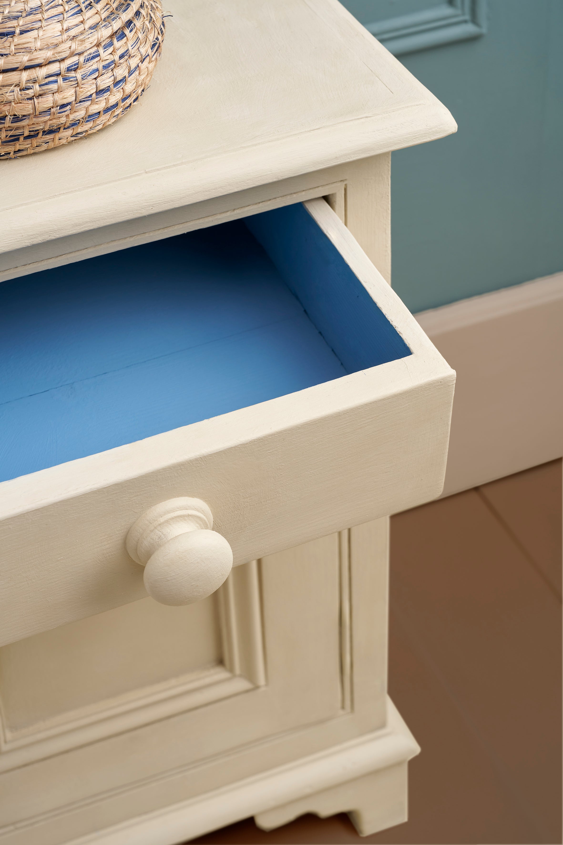 Wooden nightstand painted in Annie 
Sloan Canvas Chalk Paint  with Givency inside the drawer.