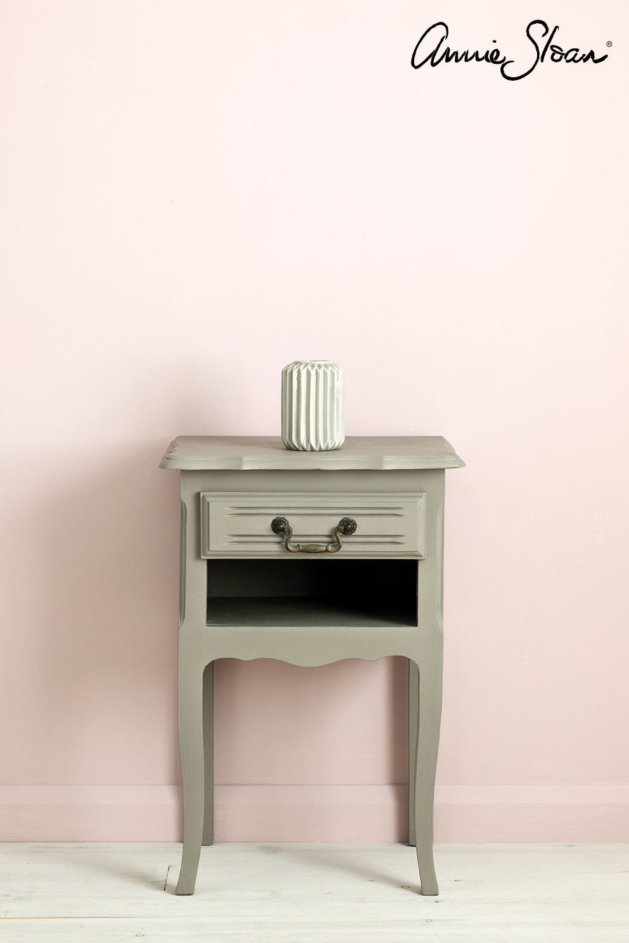 Side table painted with Annie Sloan French Linen Chalk paint against a wall painted with Annie Sloan Wall paint Antoinette