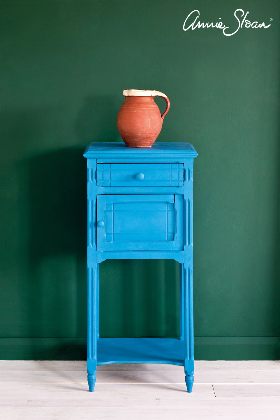 Side table painted in Giverny Chalk Paint against a wall painted in Annie Sloan Wall Paint Amsterdam Green