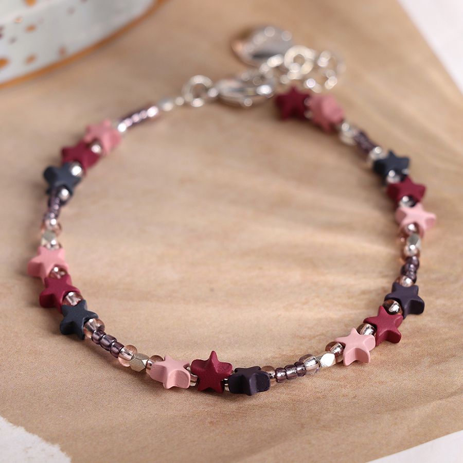 Mauve and pink star bracelet with silver plated clasp