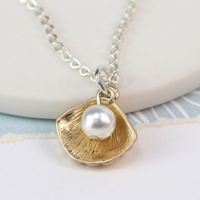 Gold plated shell and pearl necklace